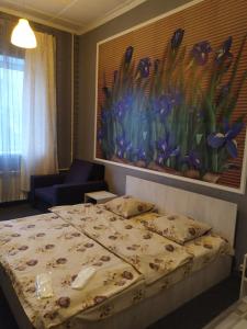 Postel nebo postele na pokoji v ubytování Mini Hotel na Gasheka