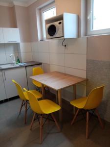 Kuchyňa alebo kuchynka v ubytovaní Apartman Pávai-Silye