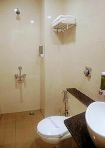 Koupelna v ubytování Hotel Laxmi Cityside + 28 fotografií