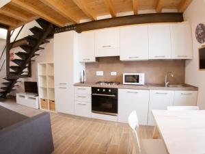 A cozinha ou cozinha compacta de FLATS 15 - New Opening