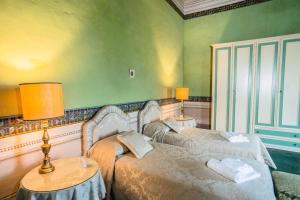 Postel nebo postele na pokoji v ubytování Buonvisi B&B