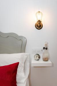 Postel nebo postele na pokoji v ubytování PALACIO Boutique
