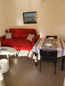 Et opholdsområde på les Huniers Appt 1er étage + 5 billeder