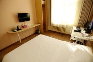 TV a/nebo společenská místnost v ubytování Beijing Sicily Hotel
