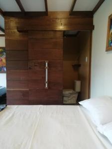Postel nebo postele na pokoji v ubytování Moon Wind Tayrona Hostel
