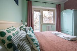 Postel nebo postele na pokoji v ubytování B&B Colorful Suite Yard