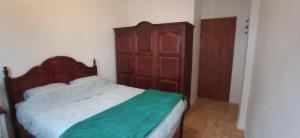 Ліжко або ліжка в номері Casa dos Buizinhos