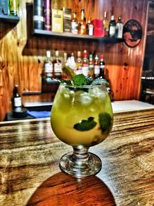 a drink sitting on top of a bar at Mar Inn Costa Rica in Monteverde Costa Rica