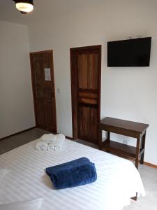 Postel nebo postele na pokoji v ubytování Pousada Cipó Paraty