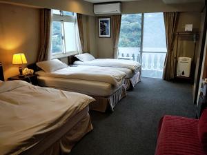 Tempat tidur dalam kamar di Levite Villa