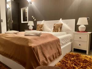 Ένα ή περισσότερα κρεβάτια σε δωμάτιο στο Happy Place