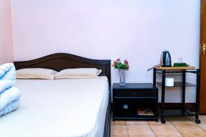 Кровать или кровати в номере KBB Hotel and Apartments Hosted by Hostmandu