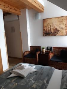 Posteľ alebo postele v izbe v ubytovaní Pension Art