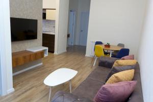 TV a/nebo společenská místnost v ubytování Sameba luxury, Golden View
