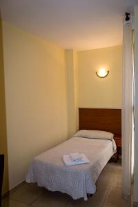 Posteľ alebo postele v izbe v ubytovaní El Roble Hotel Restaurante