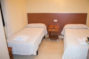 Posteľ alebo postele v izbe v ubytovaní El Roble Hotel Restaurante