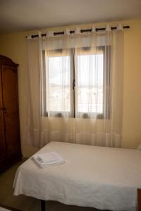 Posteľ alebo postele v izbe v ubytovaní El Roble Hotel Restaurante