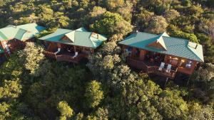 an overhead view of a house in the forest at Boardwalk Lodge – Self-Catering in Wilderness