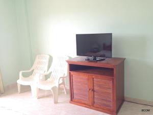 TV a/nebo společenská místnost v ubytování PTK Residence