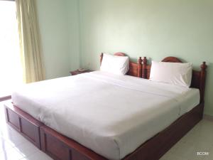 Postel nebo postele na pokoji v ubytování PTK Residence