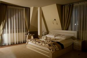 Ліжко або ліжка в номері Hotel Regent