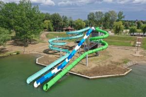 a water slide in a park in the water at Tiszavirág Vendégház in Abádszalók