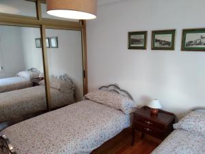 Кровать или кровати в номере CASA RÍO PEÑUELAS
