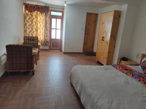 Voodi või voodid majutusasutuse Hotel BHRIGU toas