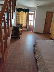 Voodi või voodid majutusasutuse Hotel BHRIGU toas
