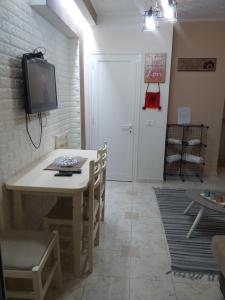 TV a/nebo společenská místnost v ubytování Friendly Apartment
