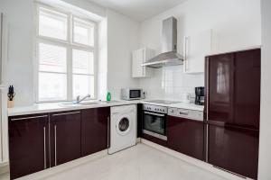Kuchyňa alebo kuchynka v ubytovaní Vienna-apartment-one Schmidgasse