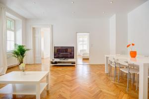 Televízia a/alebo spoločenská miestnosť v ubytovaní Vienna-apartment-one Schmidgasse