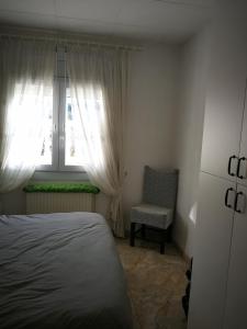 Tempat tidur dalam kamar di Villetta da Carla