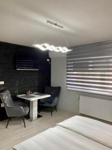 Postel nebo postele na pokoji v ubytování Apartament Catalin 1