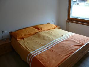Postel nebo postele na pokoji v ubytování Haus Valaisia - Randa bei Zermatt