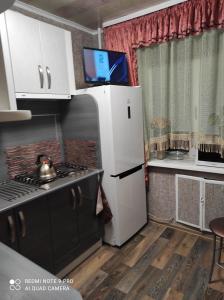 Kuchyň nebo kuchyňský kout v ubytování Apartment on Krasnoflotskaya 34