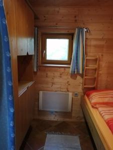 Selbstversorger Hütte Rechberg客房内的一张或多张床位