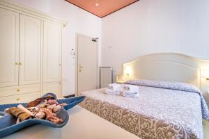 A bed or beds in a room at Miramare di Varigotti