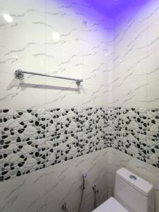 Ванна кімната в Anugrah Homestay