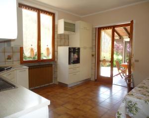 Kuchyň nebo kuchyňský kout v ubytování Casa Sara + 32 fotografií