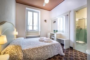 A bed or beds in a room at Miramare di Varigotti