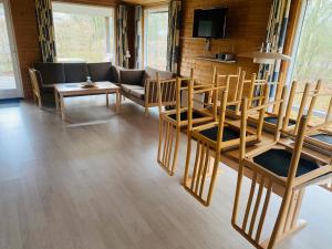TV a/nebo společenská místnost v ubytování Hummingen Camping hus 2