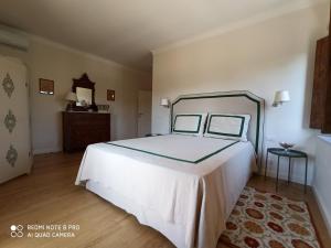 Posteľ alebo postele v izbe v ubytovaní Villa di Campagna Santa Giulia