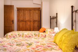 Postel nebo postele na pokoji v ubytování APARTAMENTO CASA PALOMA