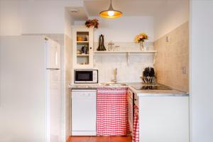 Kuchyň nebo kuchyňský kout v ubytování APARTAMENTO CASA PALOMA + 7 fotografií