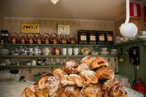 a pile of pastries sitting on top of a table at Garvaregården Hotel , B&B och Café in Askersund