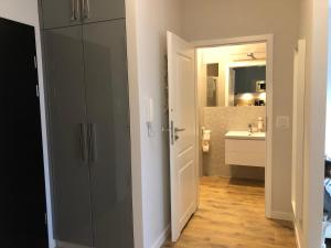 Kúpeľňa v ubytovaní Apartament Morski Keja I Kołobrzeg Podczele + 37 fotografií