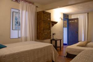 Letto o letti in una camera di Casa Encuentro Ecolodge, Outdoor Gym and Yoga