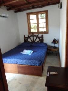 Postel nebo postele na pokoji v ubytování Bed & Breakfast T.T