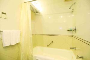 Vannituba majutusasutuses Yihe Hotel Ouzhuang